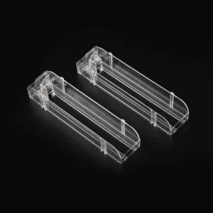 Transparent cigarette pusher measuring 2.48 inches by 11 inches
