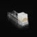 Transparent cigarette pusher holding a cigarette pack