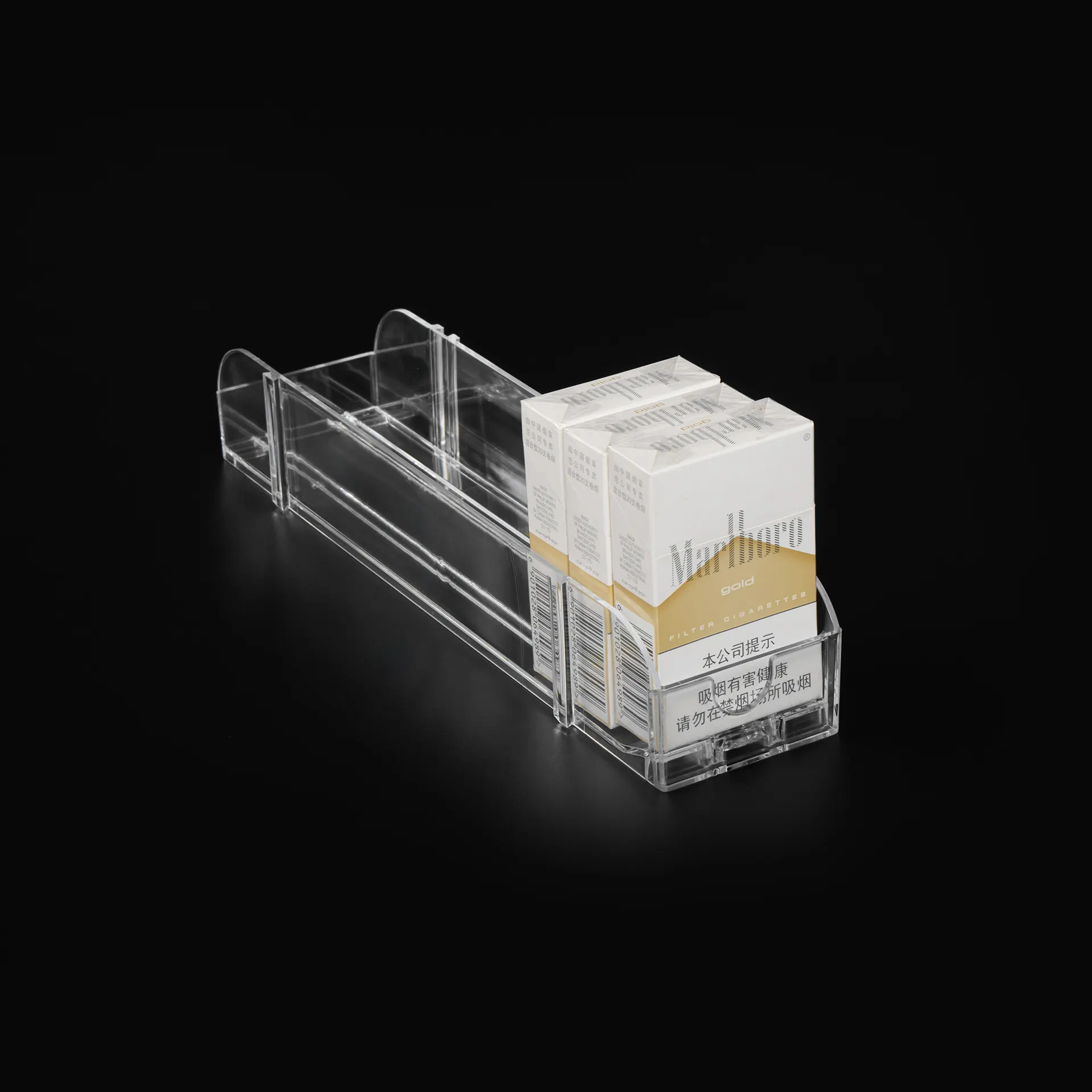Transparent cigarette pusher holding a cigarette pack