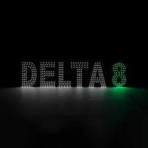 Professional bright green LED dot-matrix sign for Delta 8 THC products. Features glowing green bulbs in a static display for smoke shops and dispensaries. 30-inch wide storefront window signage with hanging chain.