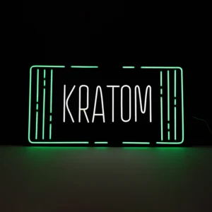 Vibrant green and white LED neon flex sign featuring the word "KRATOM" in modern typography with a decorative green border. Ideal for kratom shop storefronts and specialty retail visibility. 35x17 inch dimensions.