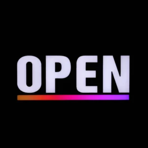 LED open sign with bold white letters and rainbow underline for storefront business display.