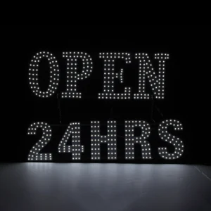 Professional white LED dot-matrix sign displaying "Open 24 Hrs" in bright individual glowing bulbs. High-visibility 24x15 inch storefront window signage for convenience stores, cafés, and tobacco shops.