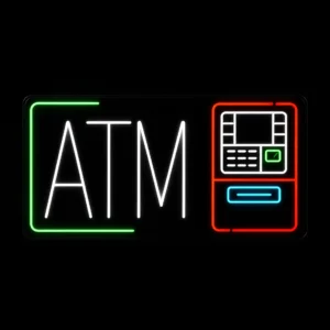 ATM neon LED sign with white red ice blue and green lighting mounted on black backing board for storefront display